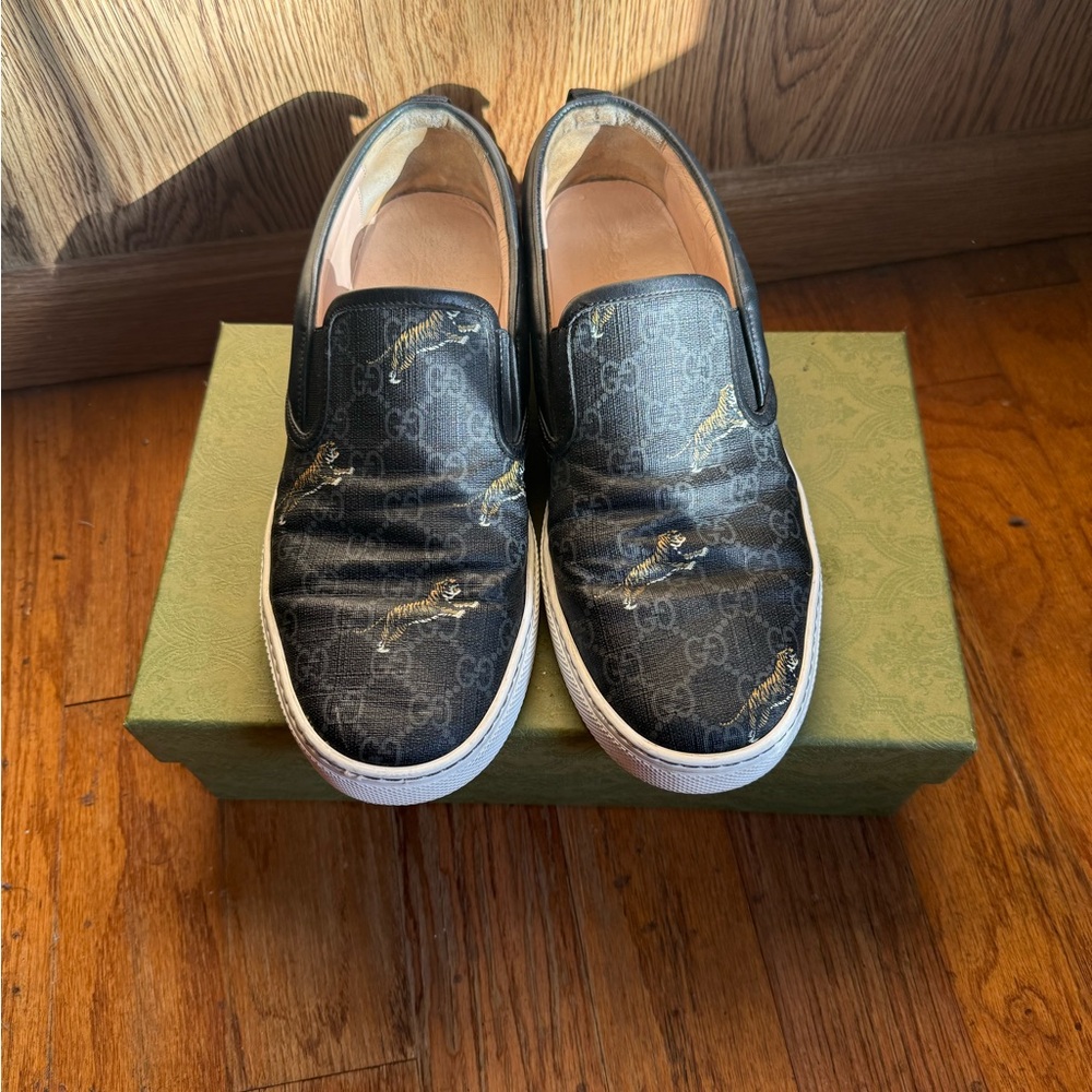 Gucci Black Slip-On Sneakers with Gold Details